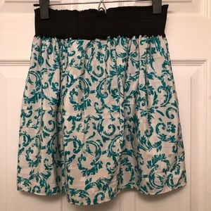 Green and white patterned skirt black waste band